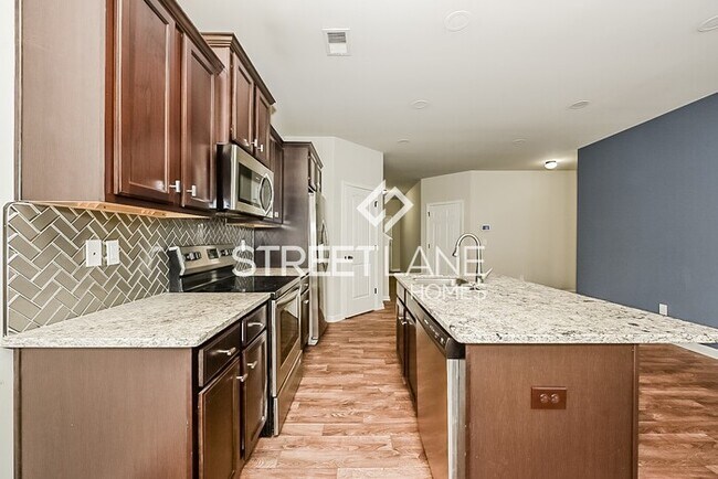 Building Photo - NOW OFFERING $1000 OFF THE FIRST FULL MONTH!