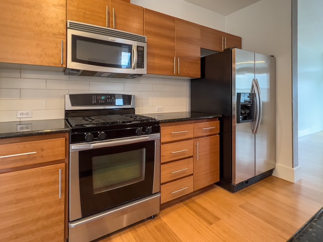 Building Photo - Enjoy this 3 Bedroom 2.5 Bathroom End Townhome ~ 2 Car Garage + Washer & Dryer! Great Cedar Mill ...