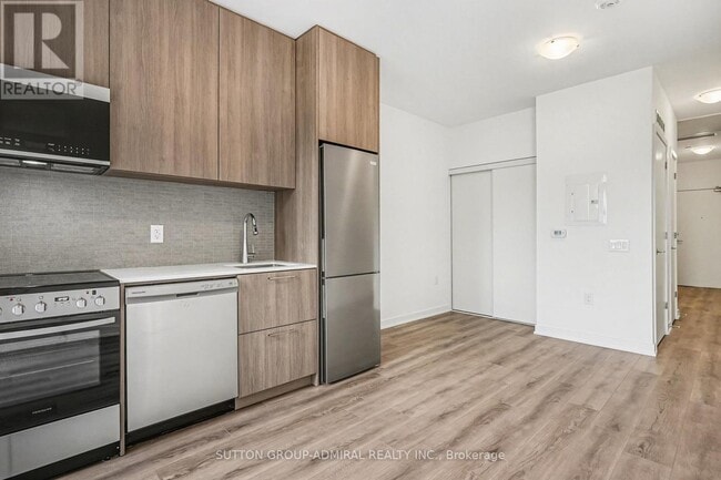 Building Photo - 7437 Kingston Rd