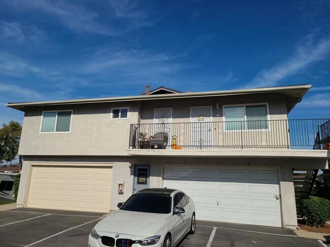 Building Photo - Adorable Upper Unit Condo with 1 Car Garage!