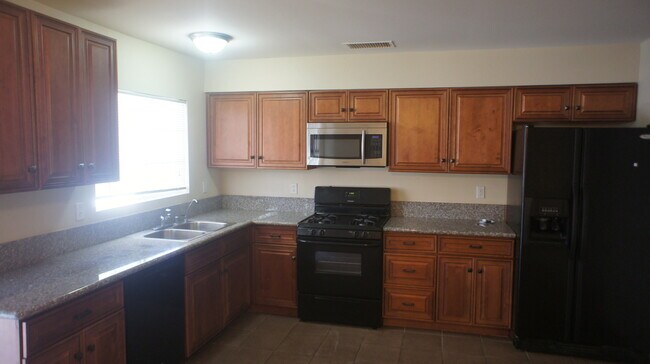 Foto del edificio - Charming 3Bed/2Bath/2Car residence with gated pool located in E. Las Vegas