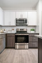 Two color custom cabinetry in your kitchen at Hawthorne at the Glen in Concord, NC - Hawthorne at the Glen