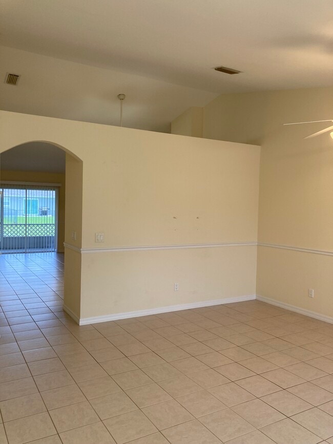 More living area with custom chair rail - 3224 SW 7th Pl