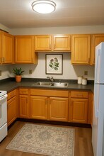 Building Photo - Metropolitan Village Apartments - 55 + Years