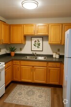 Building Photo - Metropolitan Village Apartments - 55 + Years
