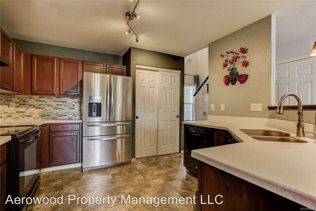Building Photo - 3 br, 3 bath House - 1246 S. Zeno Circle # E