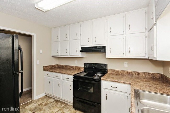 Building Photo - 4 br, 2 bath House - 748 S Carter Dr