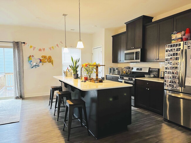 Open kitchen with center island - 128 Lanyard Dr