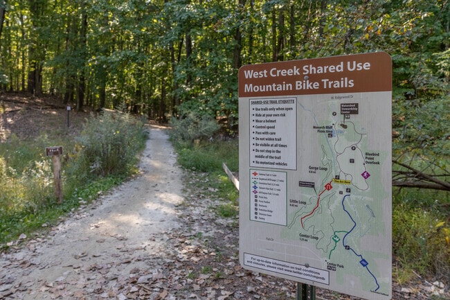 Mountain bike through West Creek Reservation in Seven Hills.