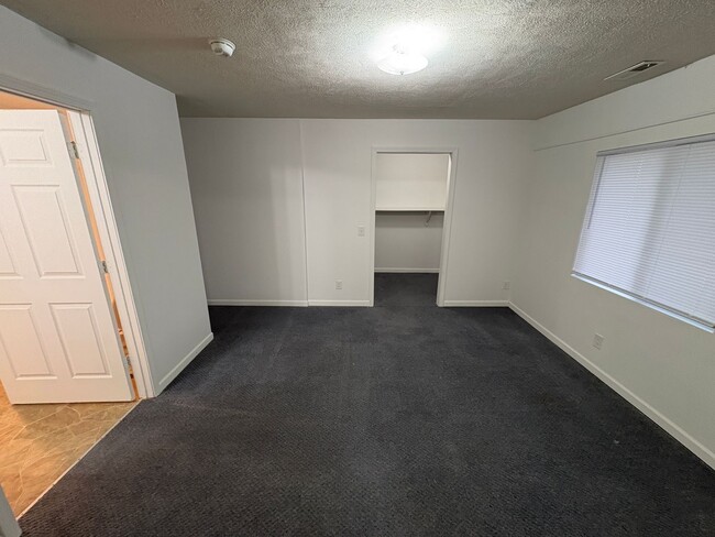 Building Photo - Lovely & Spacious 4-Bed, 2-Bath Single-Family Home Near Everything You Need