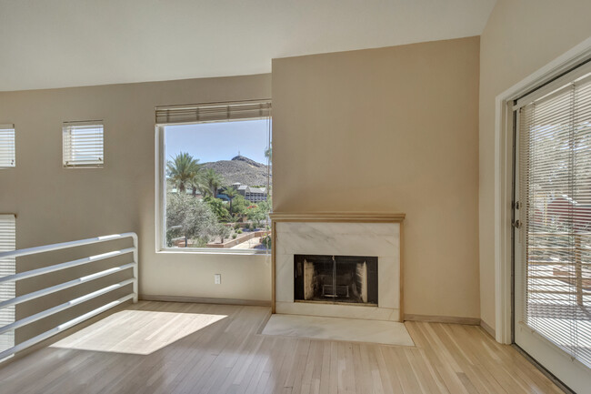 living room with fireplace & balcony - 154 W 5th St