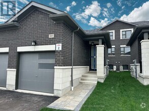 Building Photo - 985 Crowsnest Holw