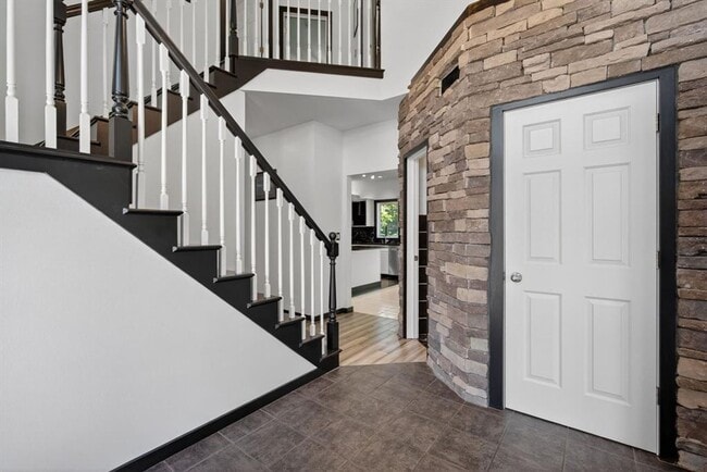 Building Photo - Spacious 5-Bed Walkout Home with Over 3,50...
