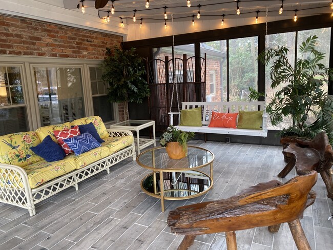 An evening retreat under glowing lights, where your oasis view takes center stage. - 5460 Scofield Rd