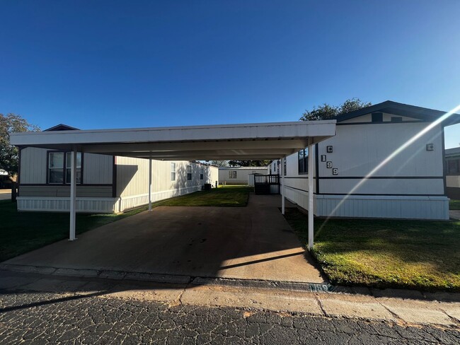 Building Photo - 2/2 Carport in Commanders Palace, In Frens...