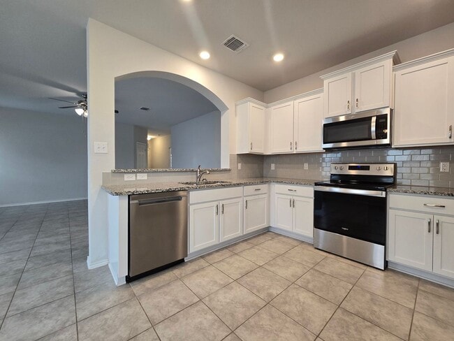 Building Photo - RENT REDUCTION - AVAILABLE NOW!