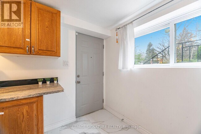 Photo du bâtiment - 406 Tamarack Dr