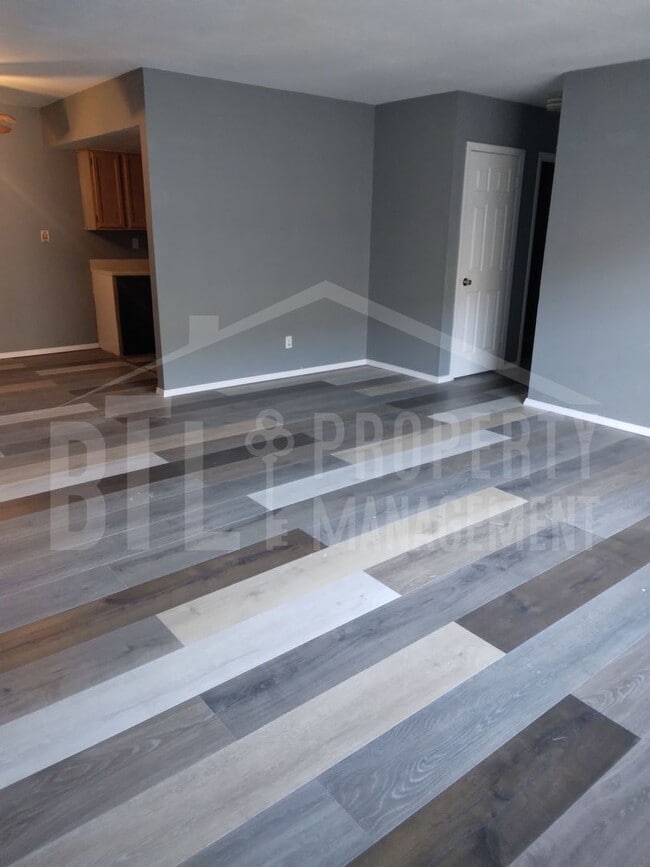 Building Photo - Three Bedroom Duplex