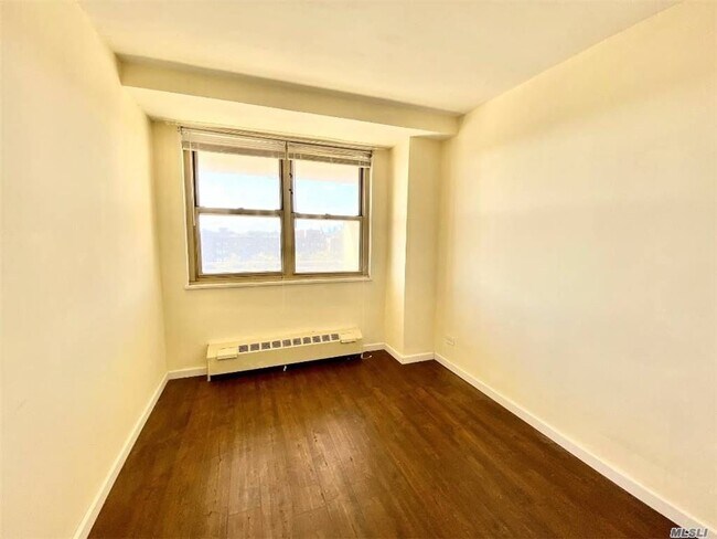 Building Photo - 81-11 45th Ave
