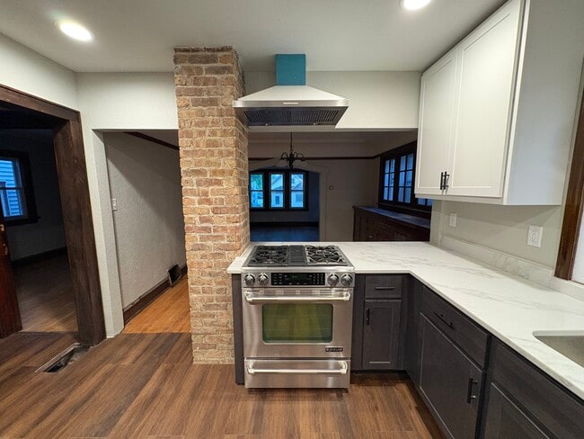 Open concept view from kitchen into dining room - 861 S 75th St