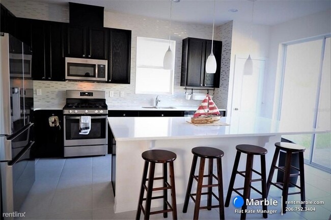 Building Photo - 3 br, 3 bath House - 8271 Bayliss Ct