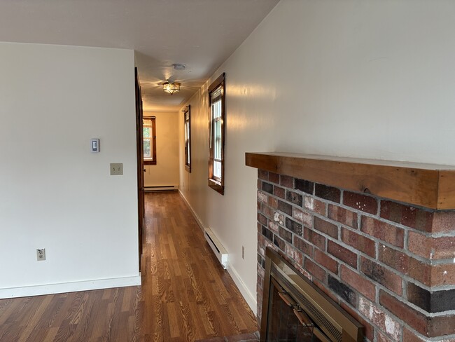 Living Room to Kitchen - 300 Falmouth Rd