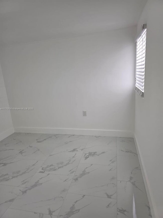 Building Photo - 3060 NW 98th St