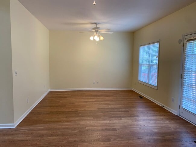 Building Photo - SPACIOUS HOME WITH DOWNSTAIRS PRIMARY BEDROOM AND BATH- LAKE WHEELER/ FARMER'S MARKET AREA