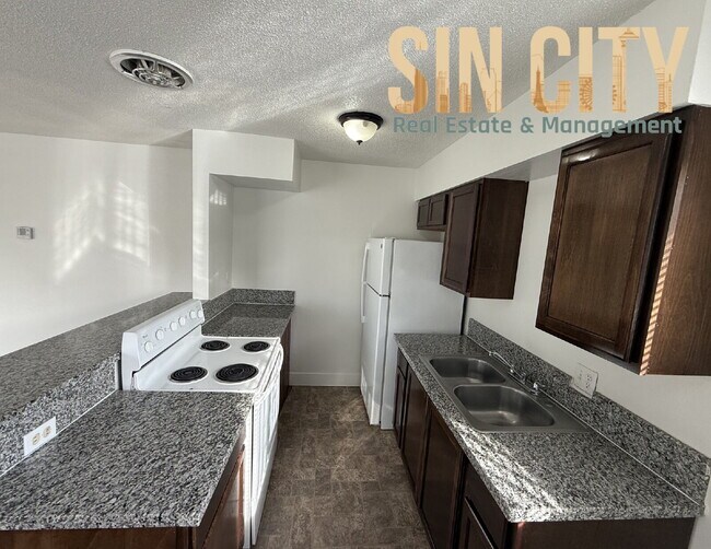 Building Photo - Discover Urban Comfort: Spacious 1-Bedroom Oasis at Lyn Capri