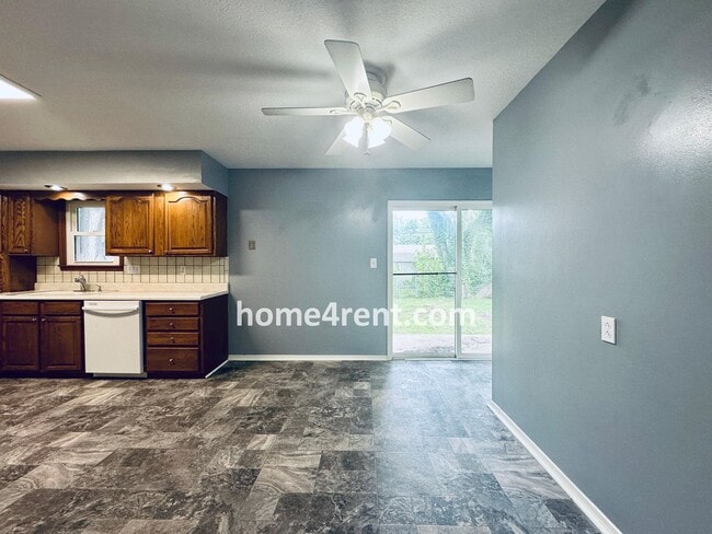 Building Photo - A Fantastic Ranch Home in Olathe with Wood...