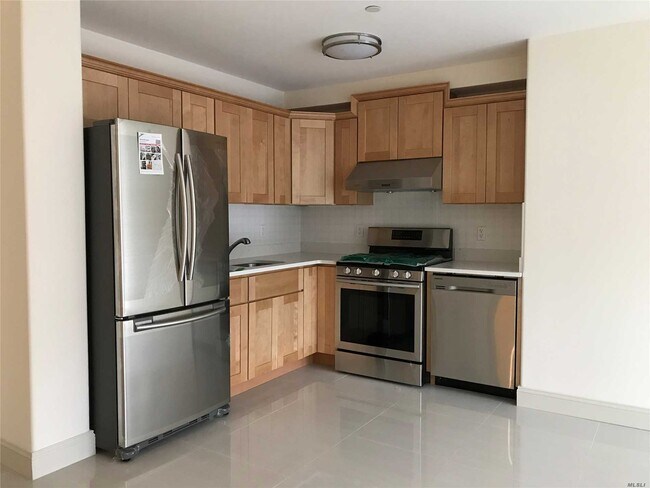 Building Photo - 65-38 Austin St