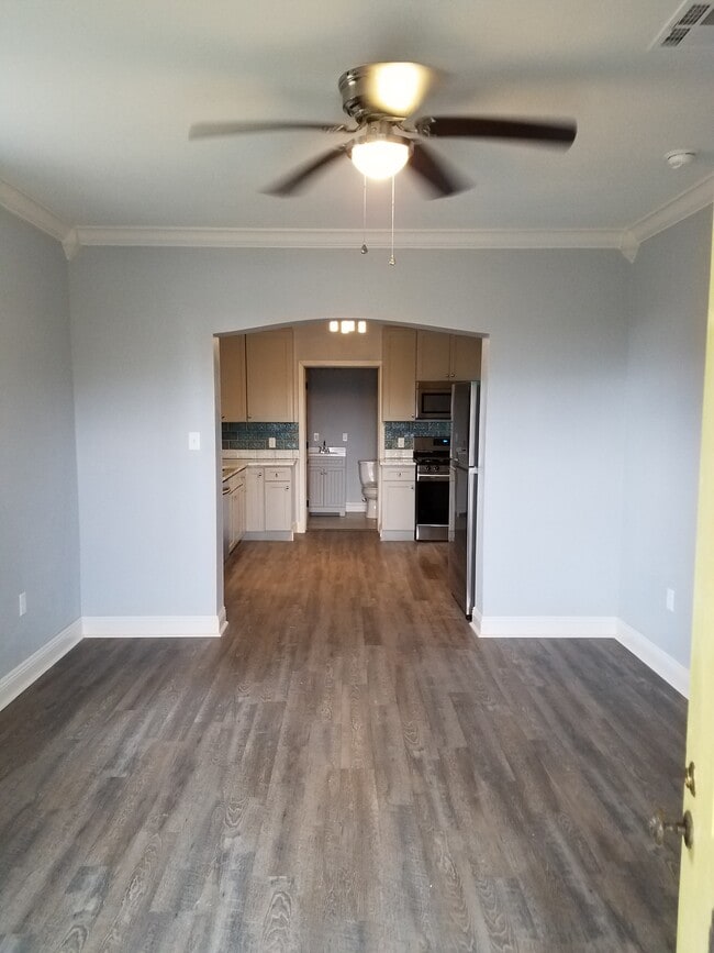 LIVING ROOM INTO KITCHEN - 1881 Abundance St