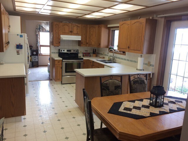 Photo du bâtiment - 5 Bed 4 Bath Unit in Olds, AB