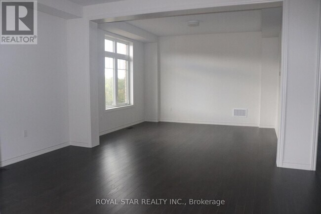 Photo du bâtiment - 69 Bluebird Blvd