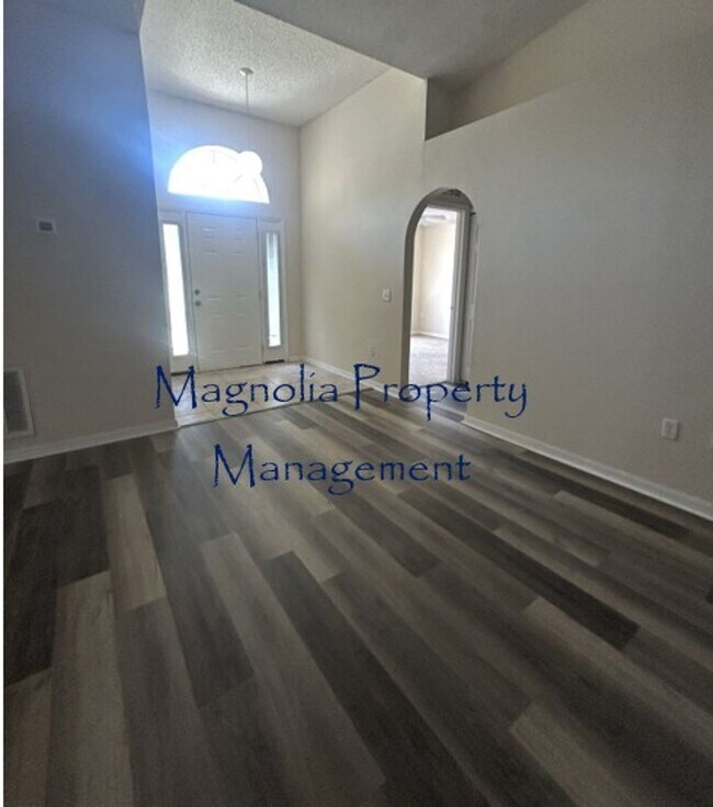 Building Photo - New Paint, Floors and Solid Surface Counte...