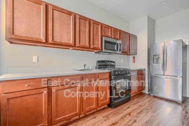 Building Photo - 717 W Lanvale St