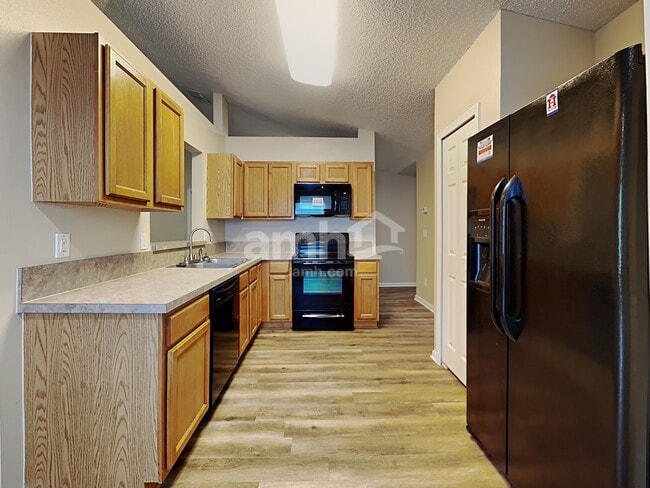 Building Photo - 9544 Watershed Dr N