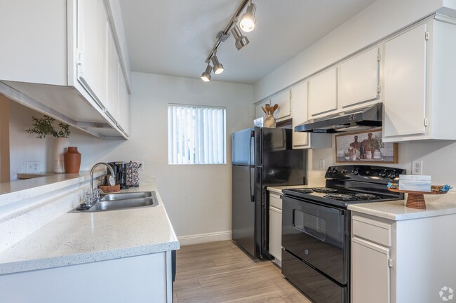 Bright kitchen space at Sunset Winds in Henderson, NV 89014 - Sunset Winds Apartments