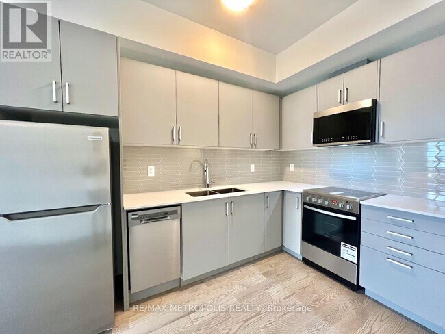 Photo du bâtiment - 8-8 Marquette Ave