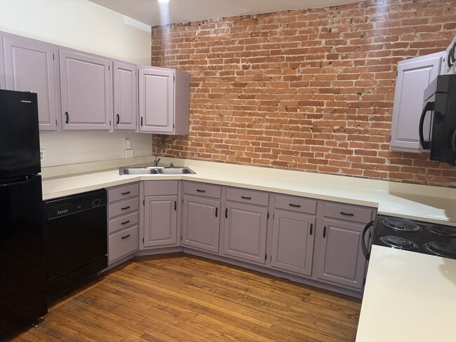 Kitchen (dishwasher, microwave, stove & refrigerator) - 1215 W 7th St