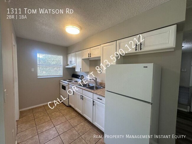 Foto del edificio - 1311 Tom Watson Rd