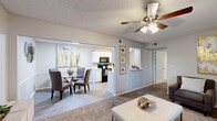 This single-story residence in Little Rock, Arkansas, offers a thoughtfully organized layout across a compact yet efficient footprint. The entryway welcomes residents with hard-surface flooring that transitions into carpet throughout the living areas, creating a warm and cohesive aesthetic.

The living room features a ceiling fan with light fixture and a window that allows natural light to fill the space. It connects seamlessly to the dining area, which accommodates a full dining set and features wood-look flooring and neutral-toned walls. The galley-style kitchen runs parallel to the dining space and is equipped with white cabinetry, light countertops, black appliances including a refrigerator, electric range, microwave, and dishwasher, along with a stainless steel sink.

The bedroom offers a comfortable layout with plush carpet, a ceiling fan, a window with outdoor views, and a reach-in closet. A dedicated in-unit laundry area with side-by-side washer and dryer hookups adds everyday convenience. Two bathrooms serve the unit, providing practical functionality. Textured ceilings and neutral wall tones are consistent throughout, contributing to a clean, move-in-ready atmosphere.