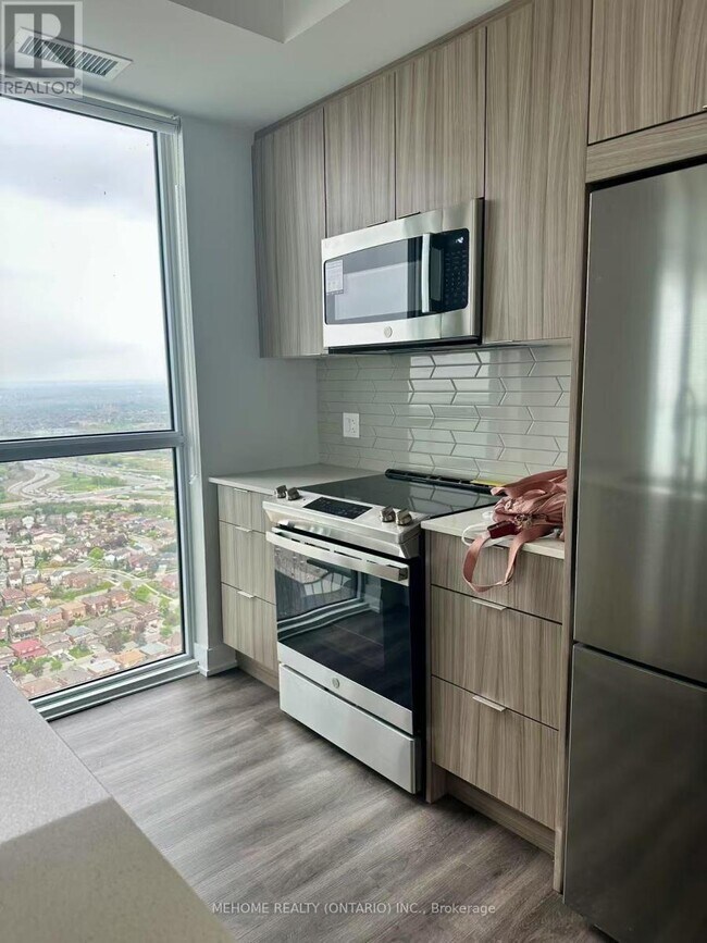 Photo du bâtiment - 430-4430 Square One Dr