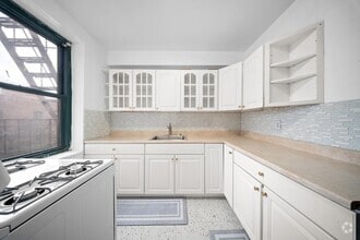 Building Photo - 34-40-40 79th St