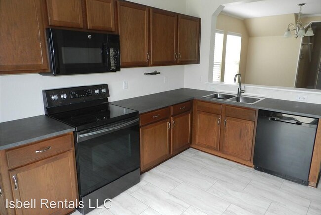 Building Photo - 4 br, 3 bath House - 5713 Capricorn Loop