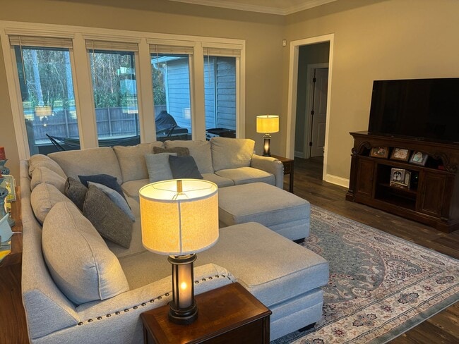 Building Photo - Spacious 4BR/3BA Creekside West Home with Screened Porch, Fenced Yard & 3-Car Garage