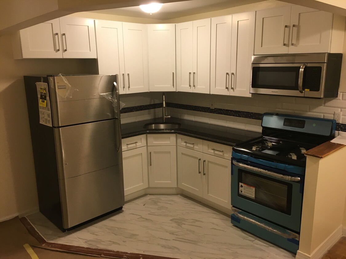 Gut renovated kitchen with brand new stainless steel appliance package. - 2823 Albemarle Road