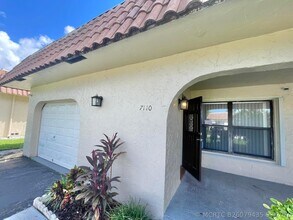 Building Photo - 7110 NW 78th Ave