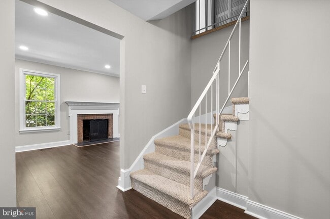 Staircase/Living Room with Fireplace - 2360 Albot Rd