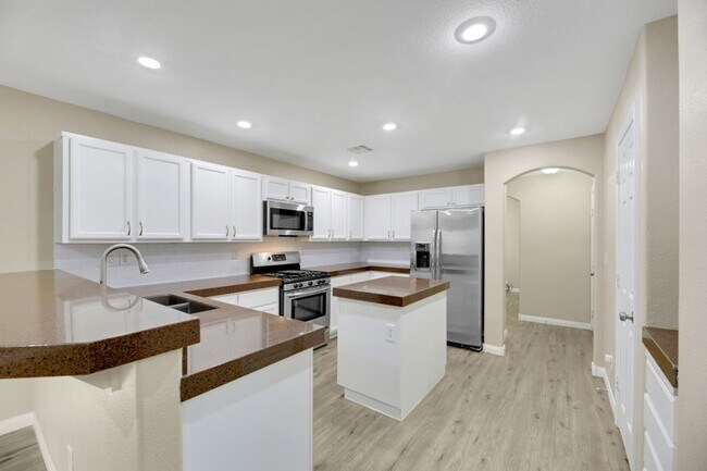 Building Photo - GATED 3 bed with large loft, dreamy backya...